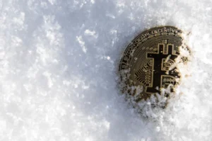 bitcoin-cryptocurrency-on-snow-background-600nw-1038215032