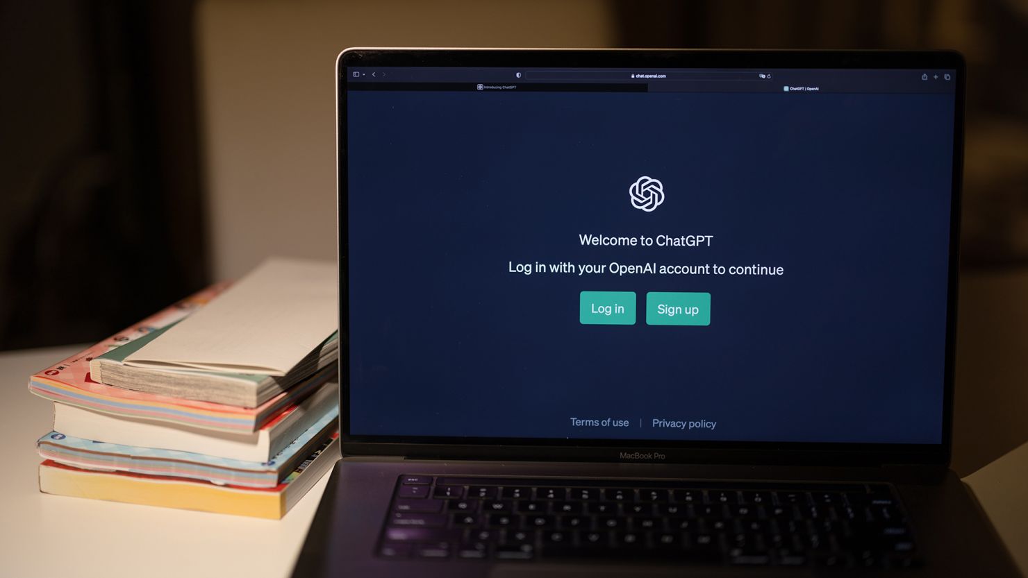 230818134054-chatgpt-laptop-books-restricted